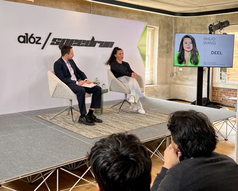 Shuo Wang in conversation onstage at an a16z Speedrun event