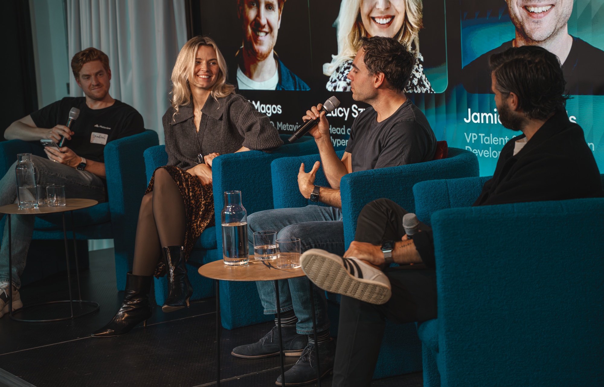 Siadhal Magos, at left, seated with fellow speakers at a 10x Recruiting panel in London