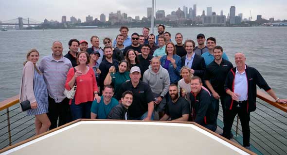 Siemplify team gathered outdoors for a group photograph