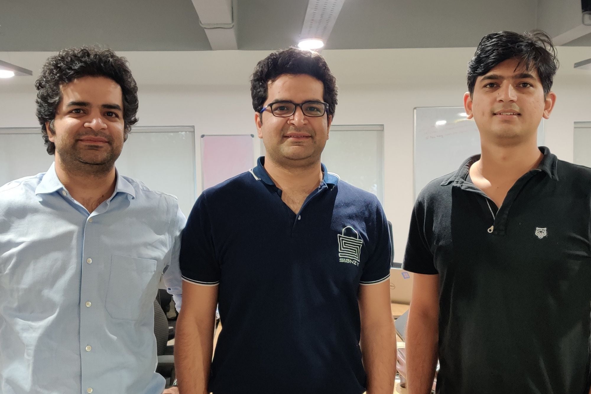 Signzy’s three co-founders photographed in an office for a 2019 feature