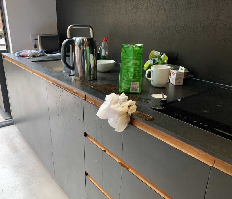 Spilled coffee on the kitchen counter at the flat rented during Plain’s early days