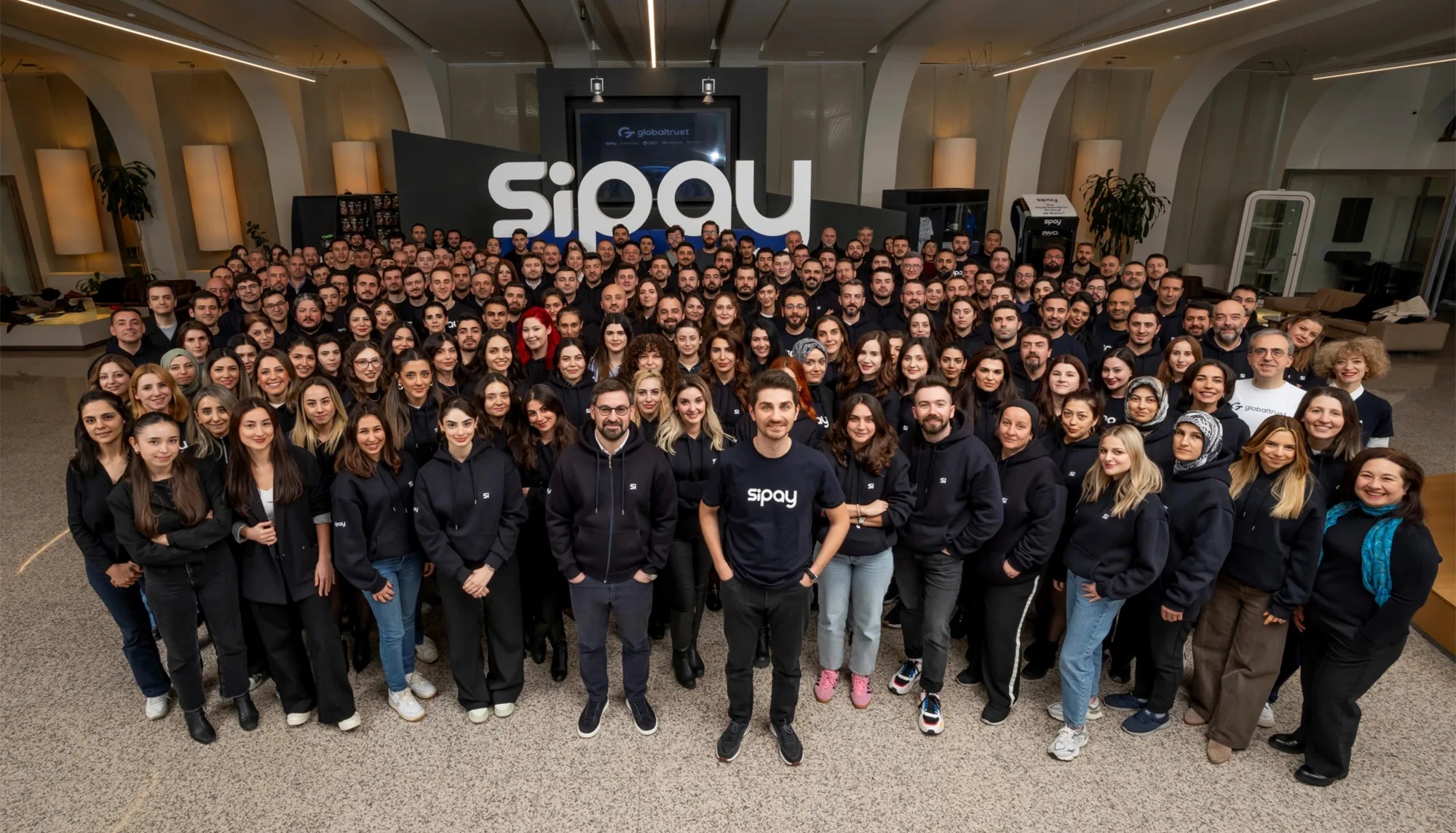 Sipay staff gathered for a company team photograph