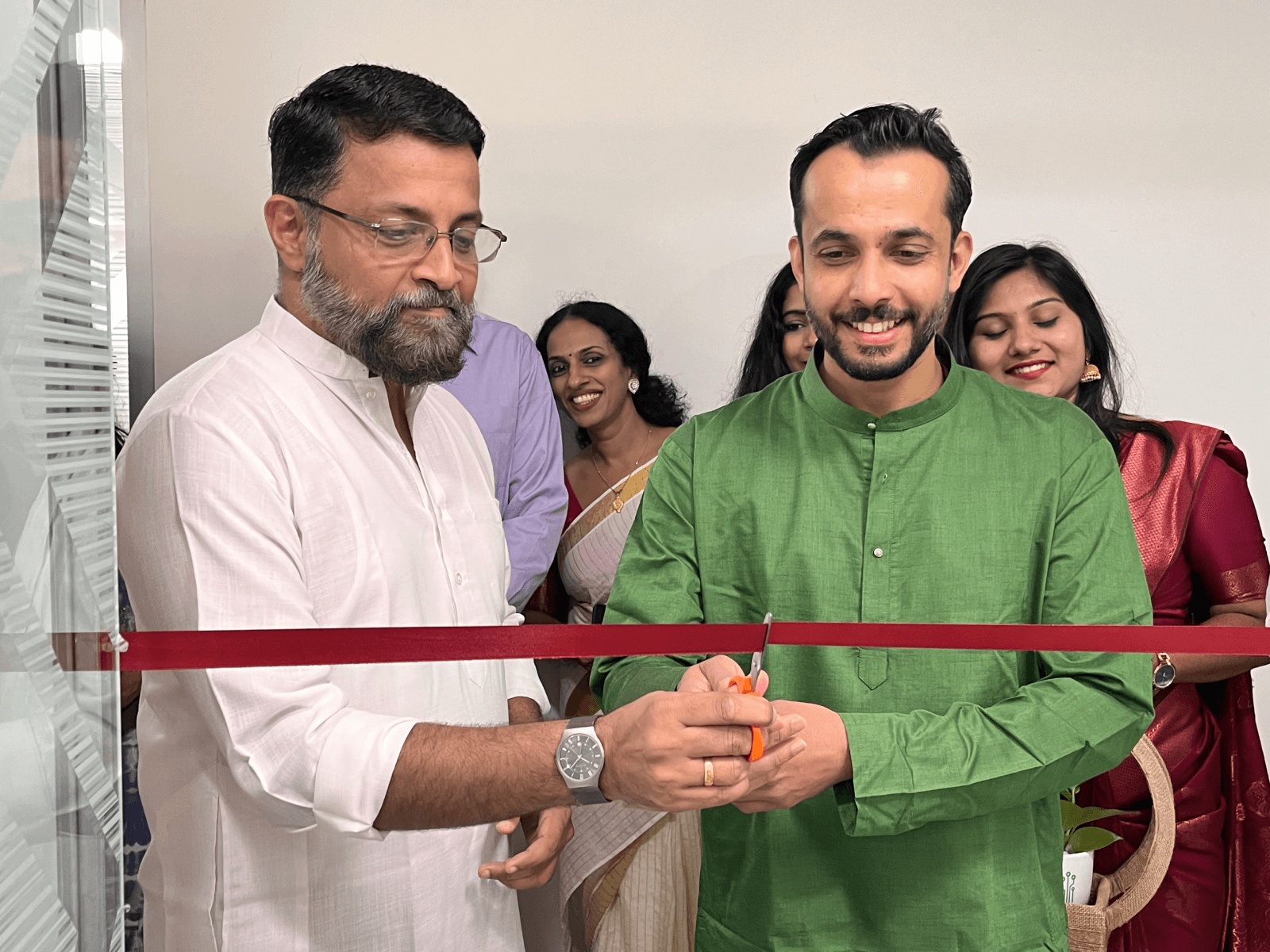 Col Sanjeev Nair and Sivakumar Thekkenaduvath cutting the ribbon at Gritstone’s Technocity office