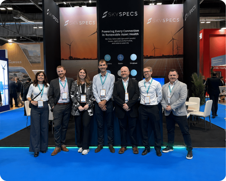 SkySpecs colleagues standing together at an industry exhibition