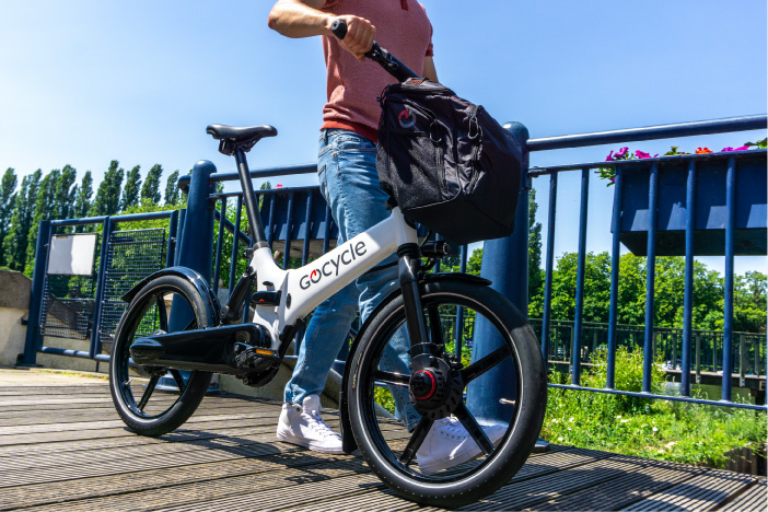 A Gocycle folding electric bike pictured in a city