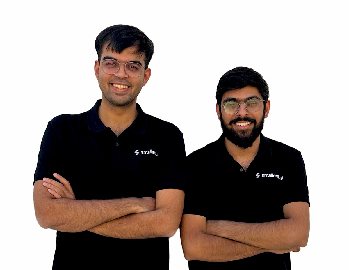 Smallest.ai co-founders Sudarshan Kamath and Akshat Mandloi standing together