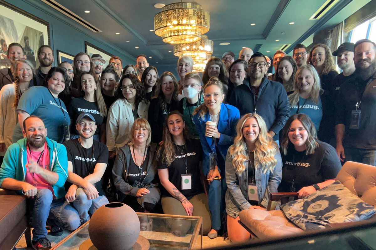 SmartBug colleagues gathered together at a company event