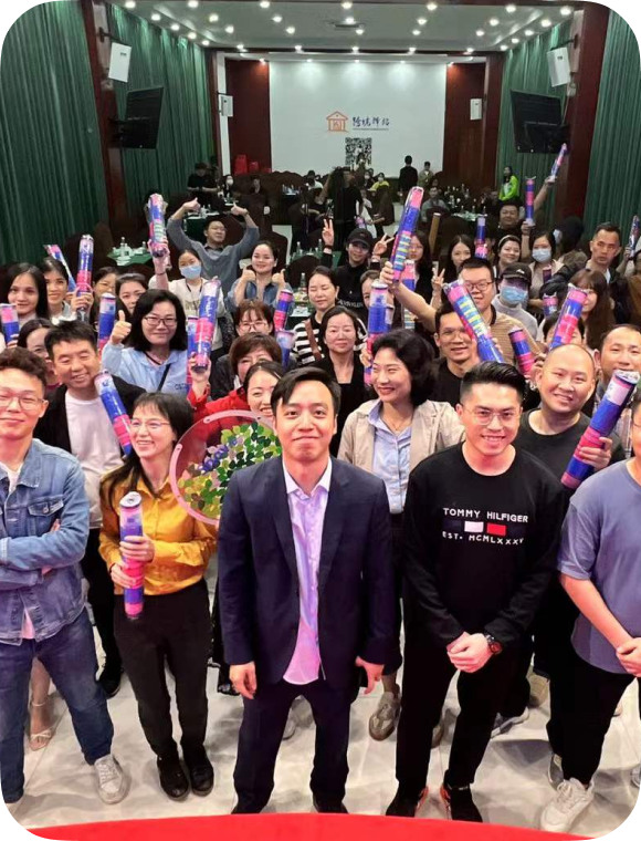 A large Snov.io team gathering at a conference