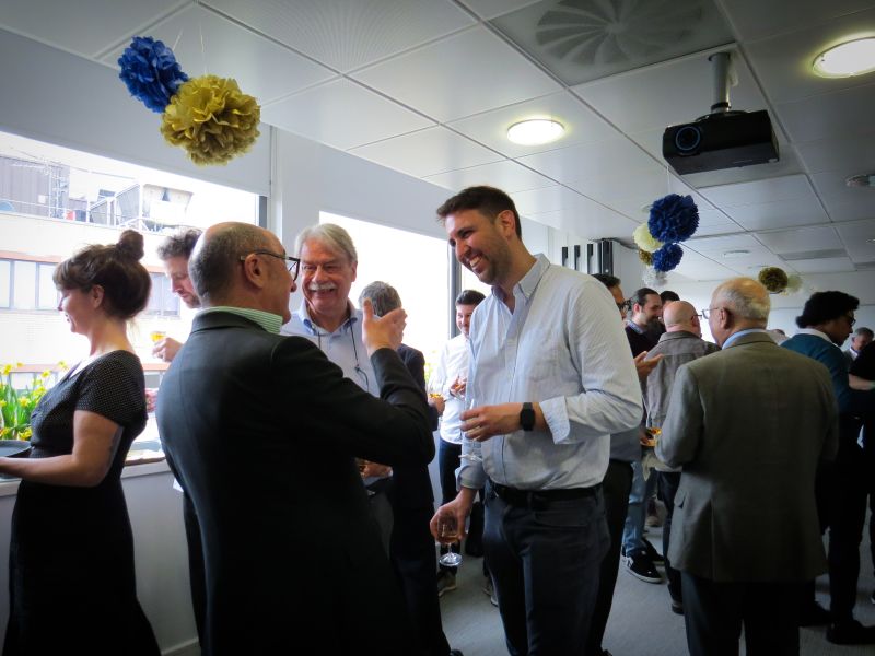 Colleagues talking together at Fincore’s April 2023 company celebration