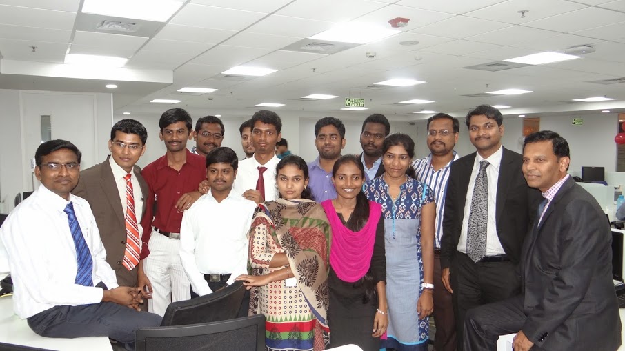Softcrylic employees gathered in an office in a photograph accompanying its 2015 anniversary announcement