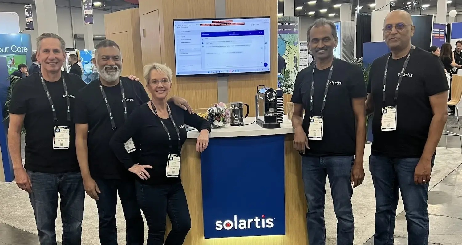 Solartis leaders Nick Richardson, Siby Nidhiry, Carol McKenzie, Srinivasan Alagarsamy and Ganesh K. Pandian at a demonstration booth