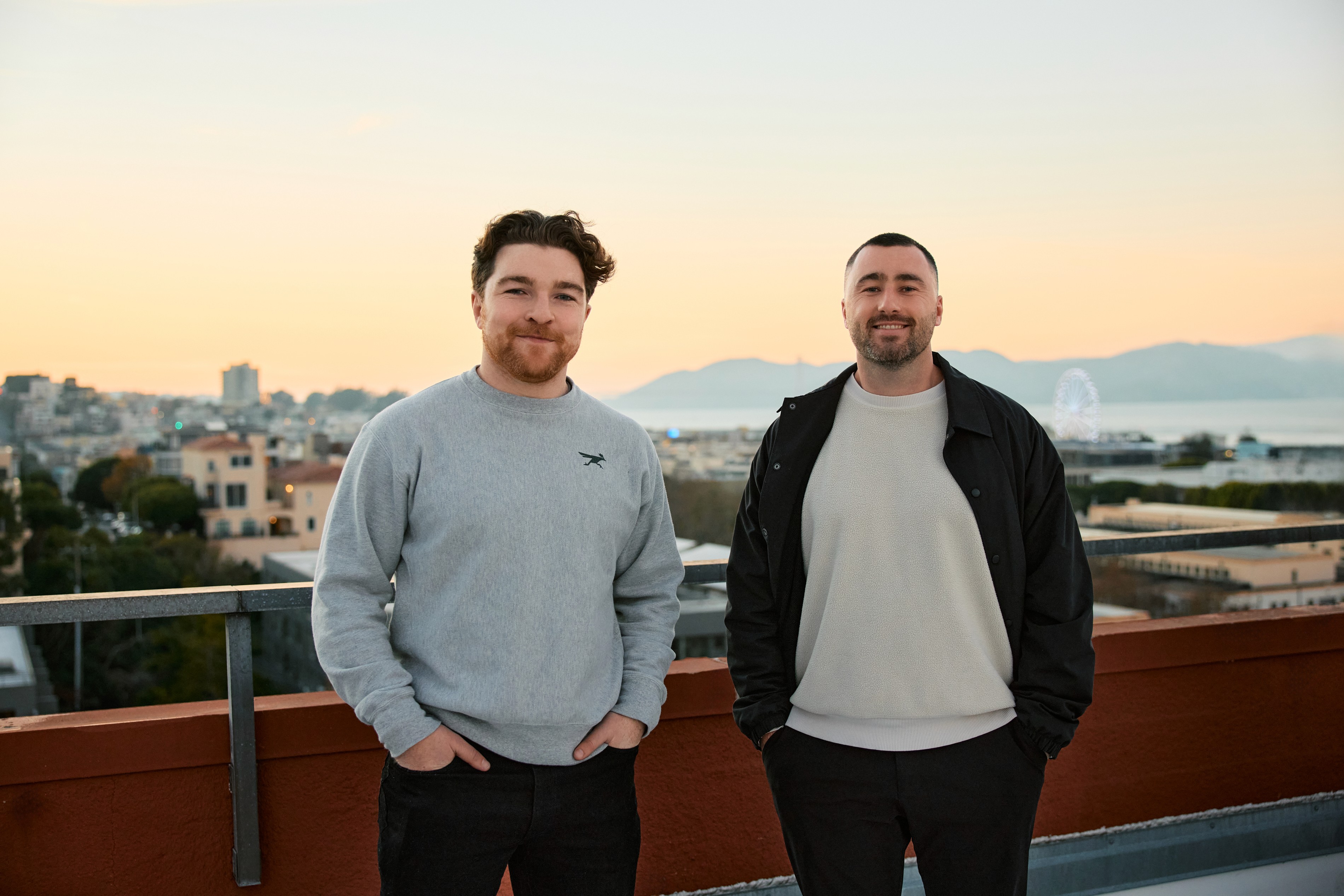 Solidroad co-founders Patrick Finlay and Mark Hughes standing outdoors in San Francisco