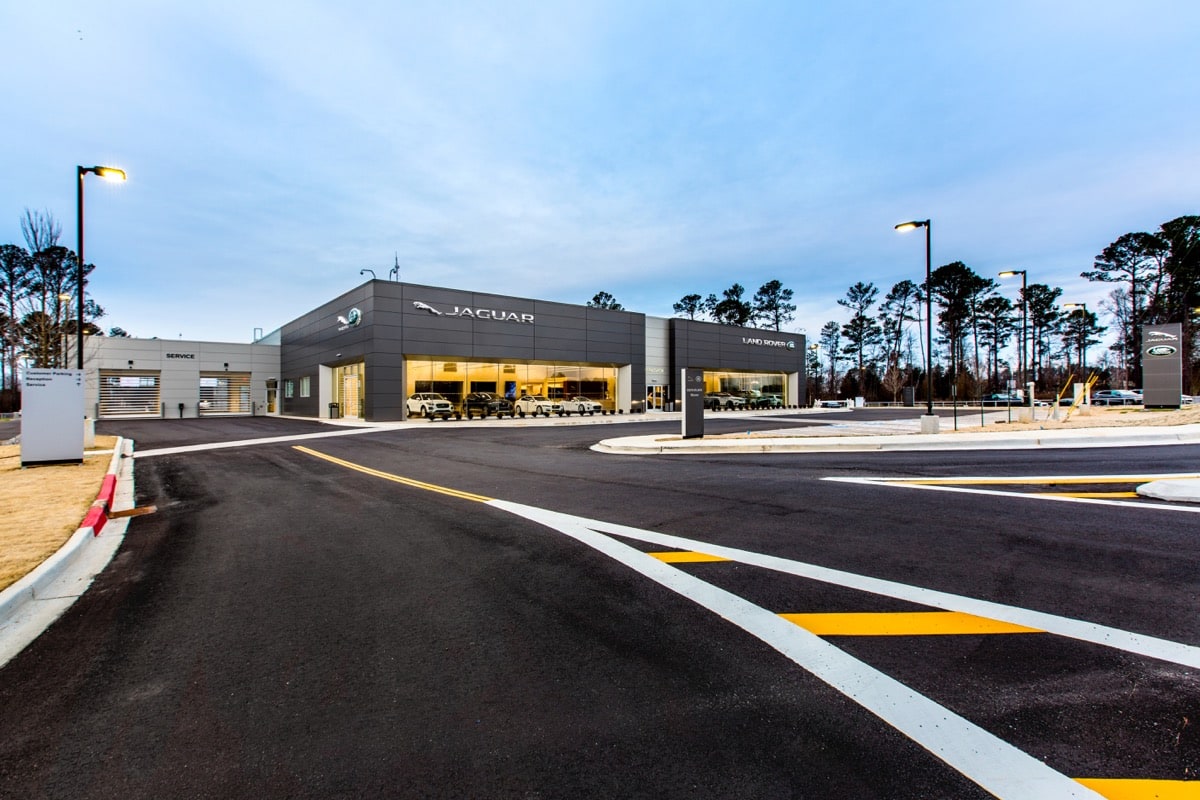 Jaguar Land Rover South Atlanta dealership at dusk