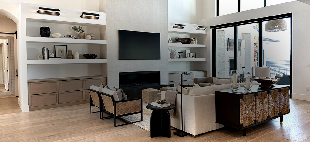 Modern living room with discreet wall-mounted audio fixtures above built-in shelves