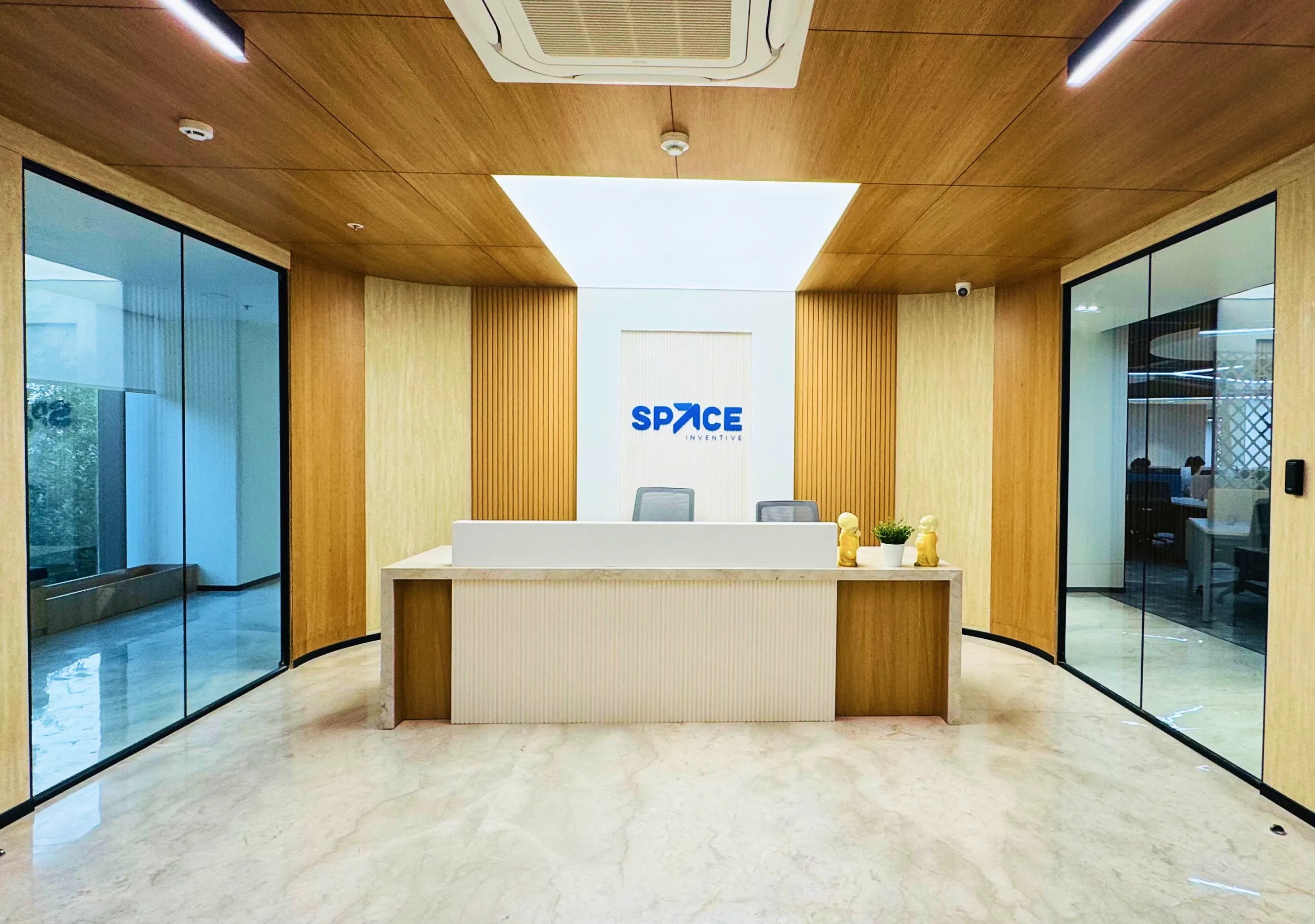Wood-lined reception area at Space Inventive’s capability center