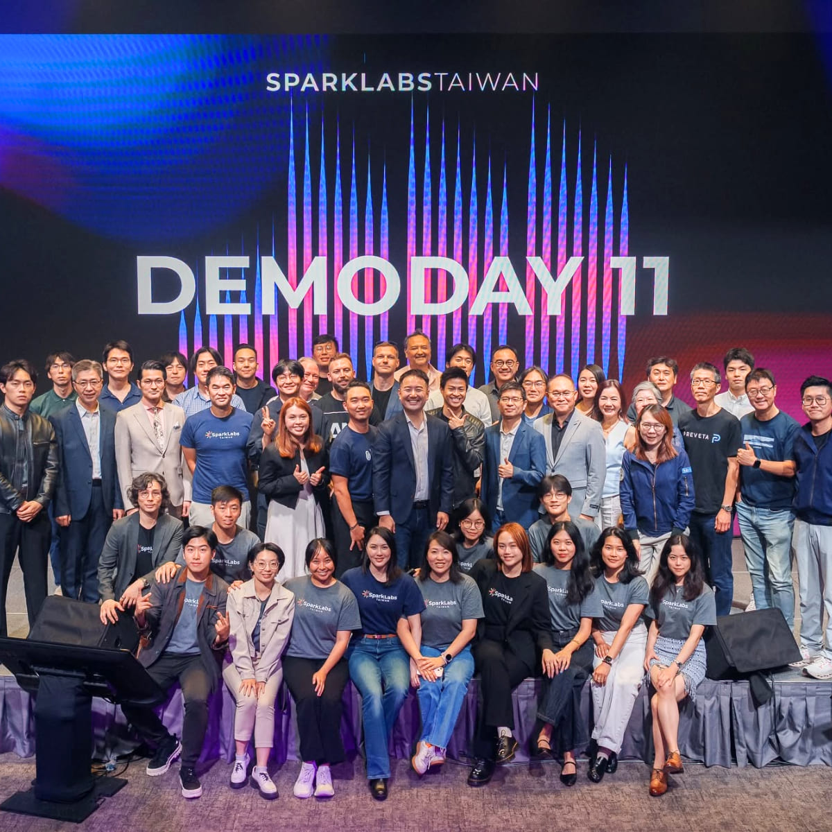 SparkLabs Taiwan cohort gathered on stage at Demo Day 11