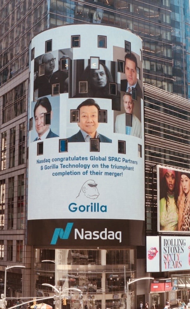 Nasdaq’s Times Square display congratulating Gorilla Technology and Global SPAC Partners on their completed merger, with Koh’s photograph among the executives