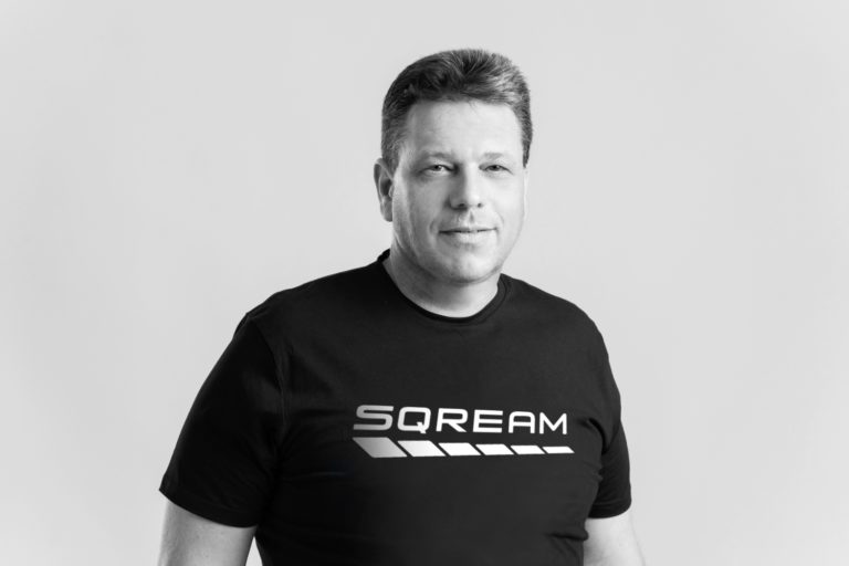 SQream co-founder Ami Gal wearing a black SQream shirt