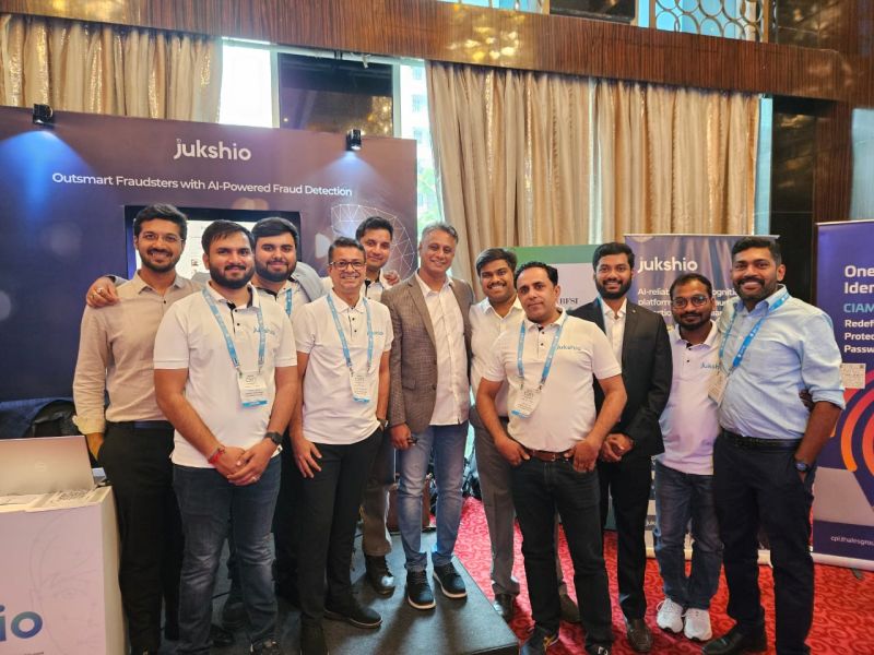 Sridhar Tirumala, near the centre in a checked blazer, with the Jukshio team at an ETBFSI event