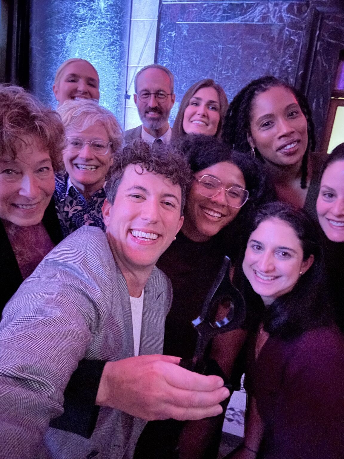 Agency colleagues gathered for a group photograph at an awards celebration in 2025