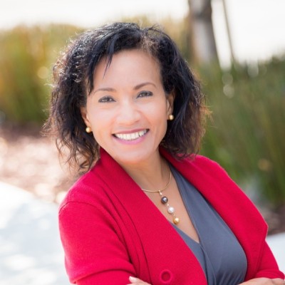 Co-founder Miriam Rivera wearing a red jacket