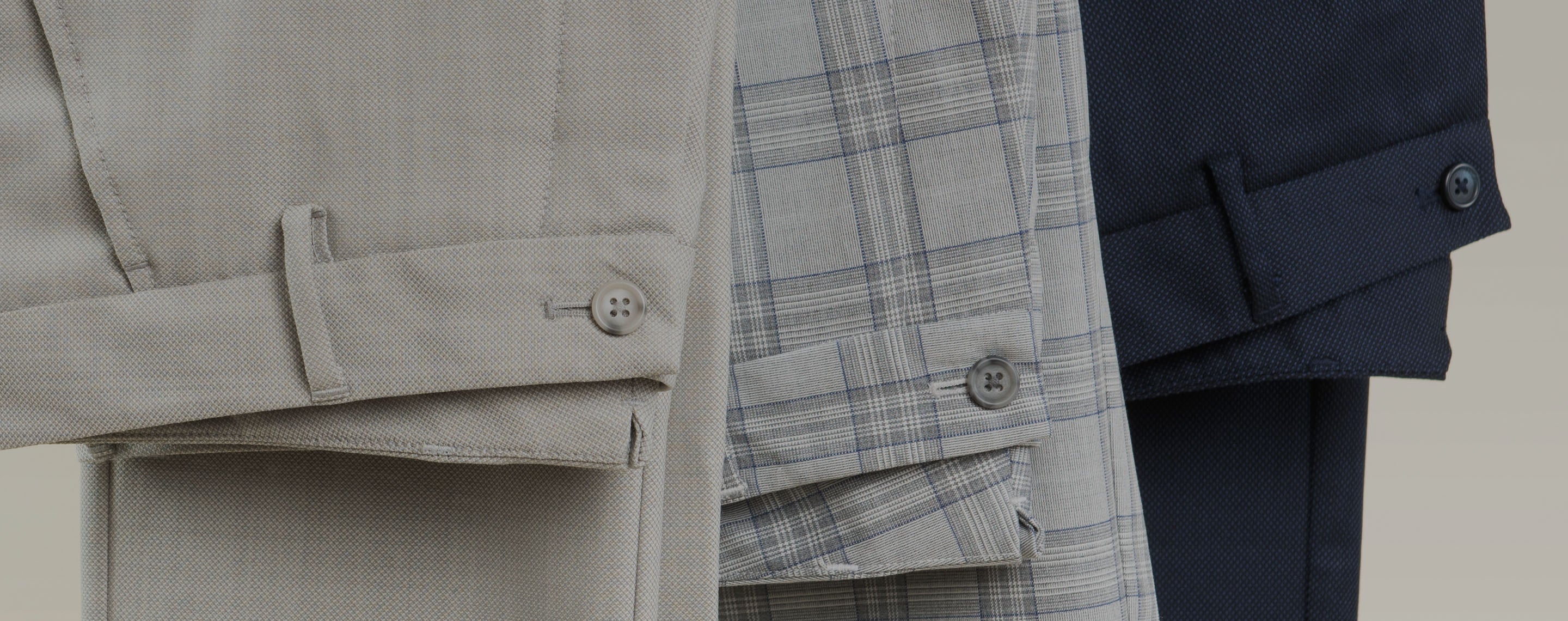 Stantt trousers in several colors displayed in a row
