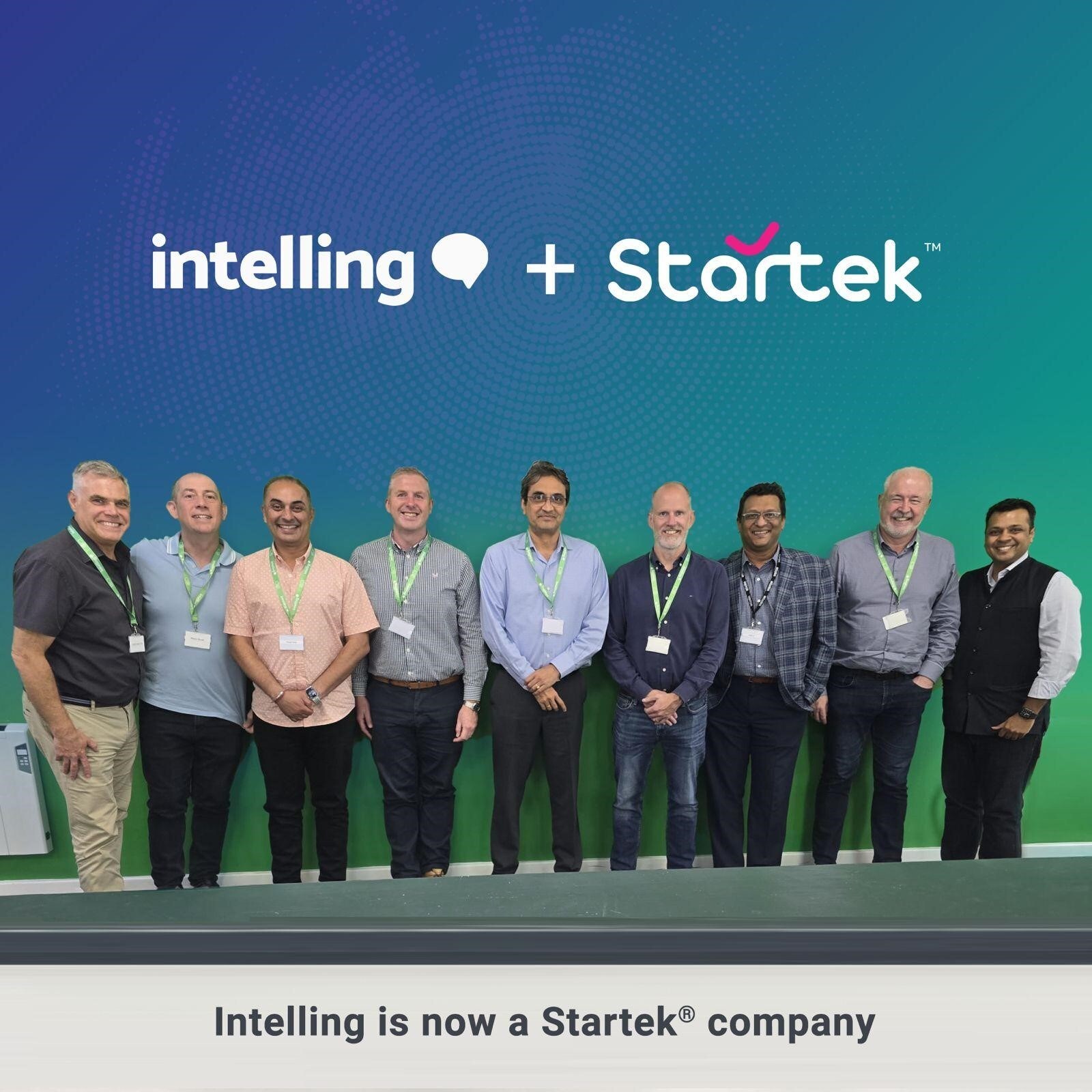 Startek and Intelling executives gathered for the acquisition announcement