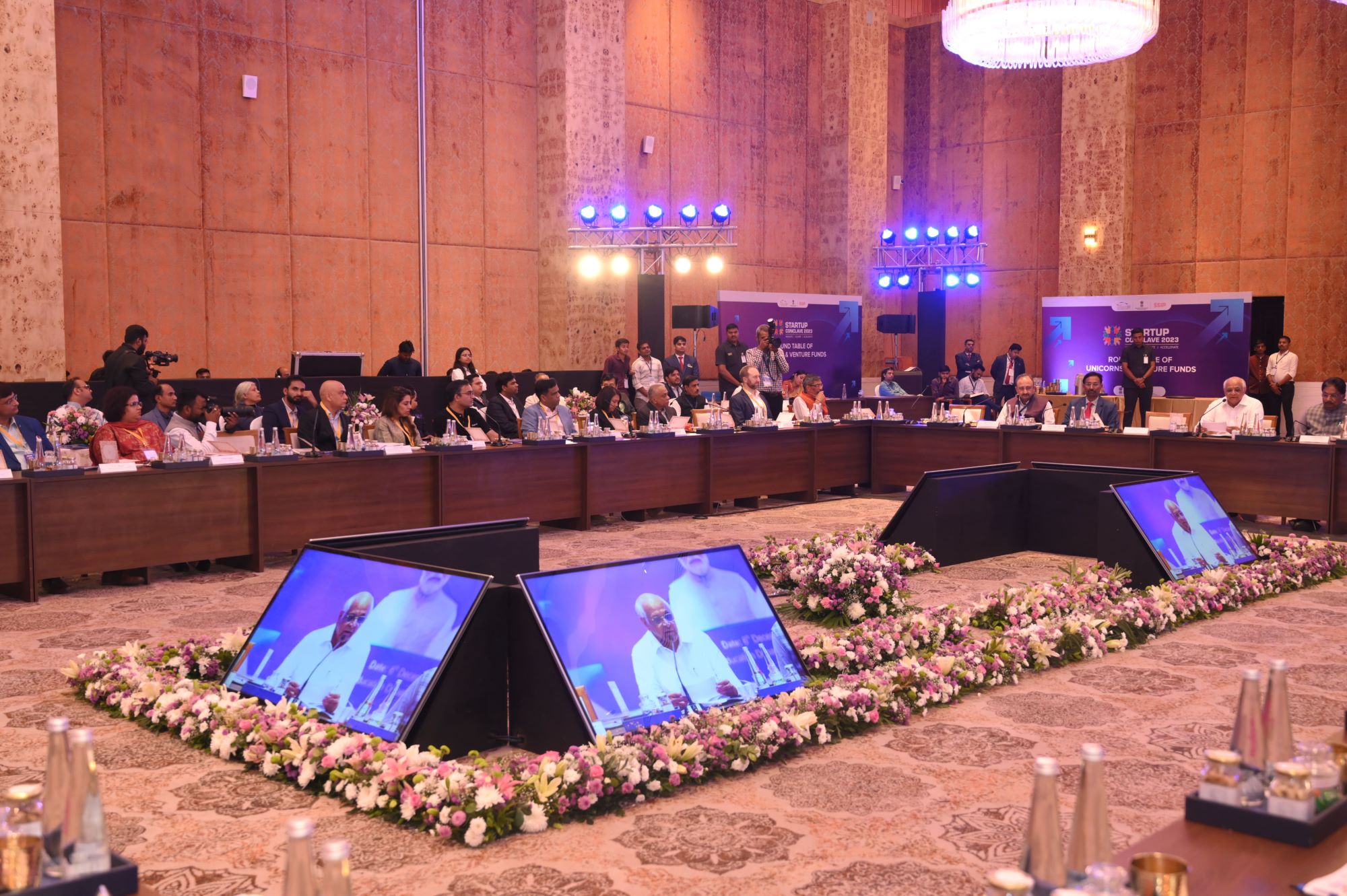 Delegates seated around the Startup Conclave 2023 unicorn and venture fund roundtable