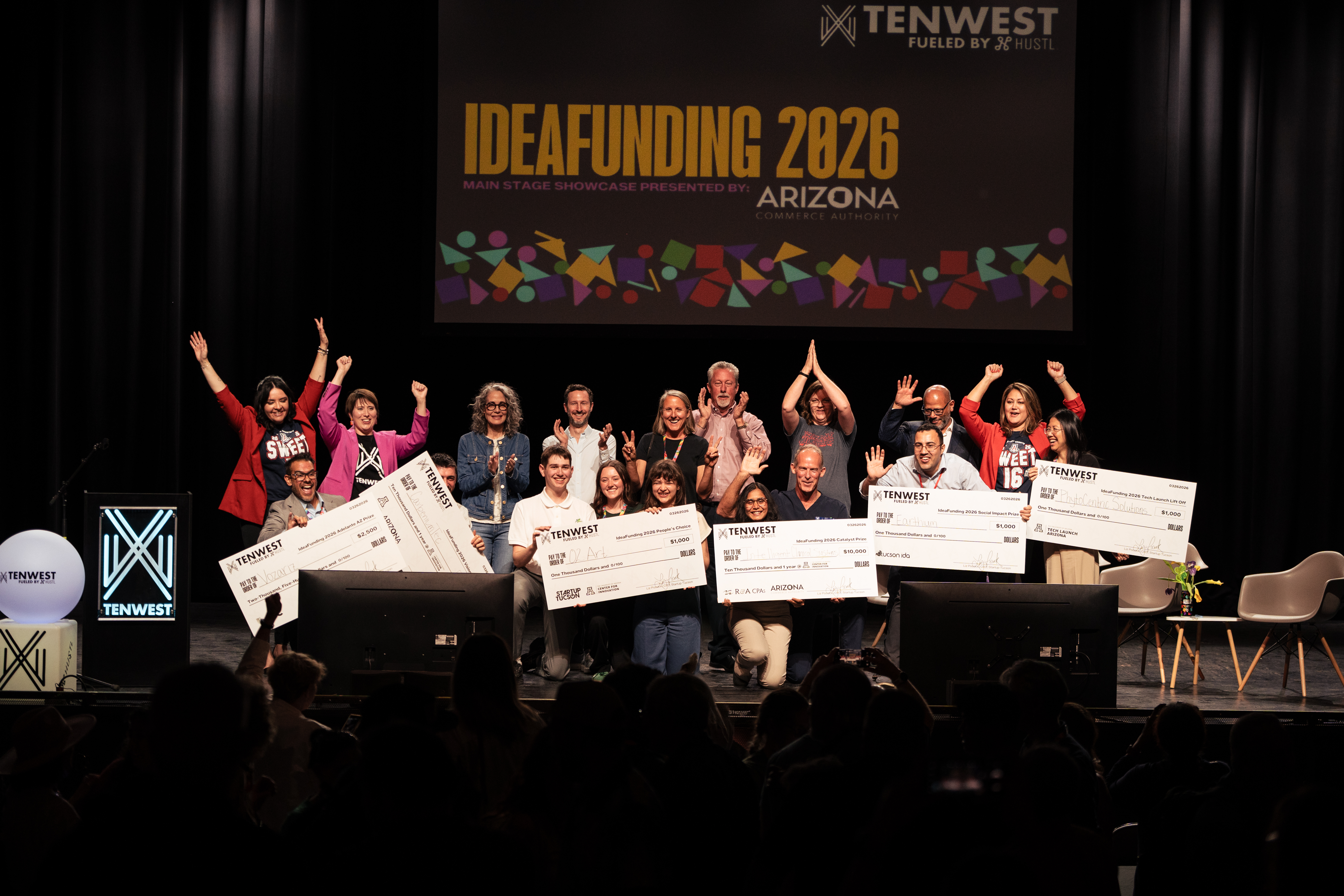 IdeaFunding 2026 participants on stage with award checks