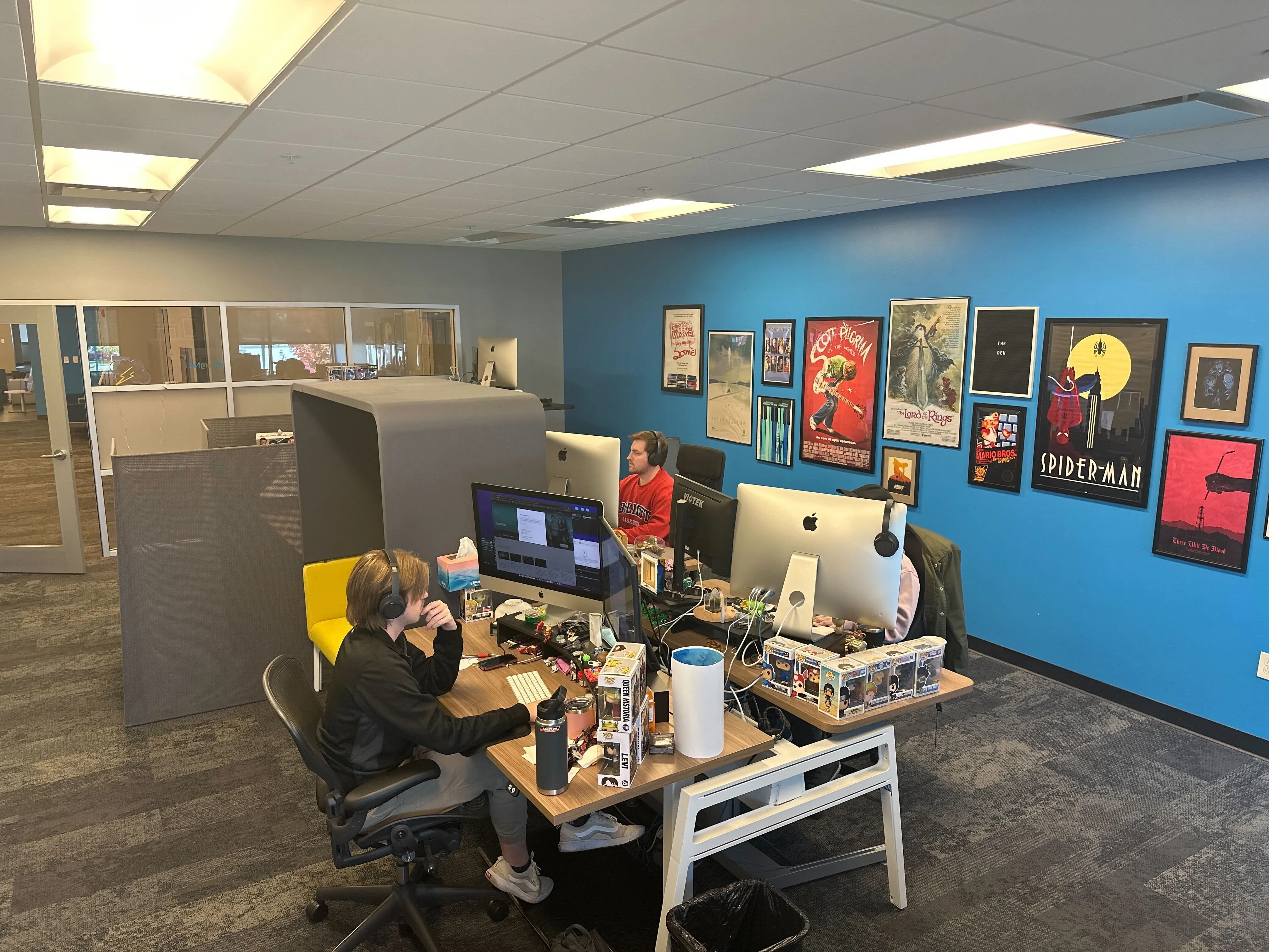 Static Media office with editing workstations and film posters