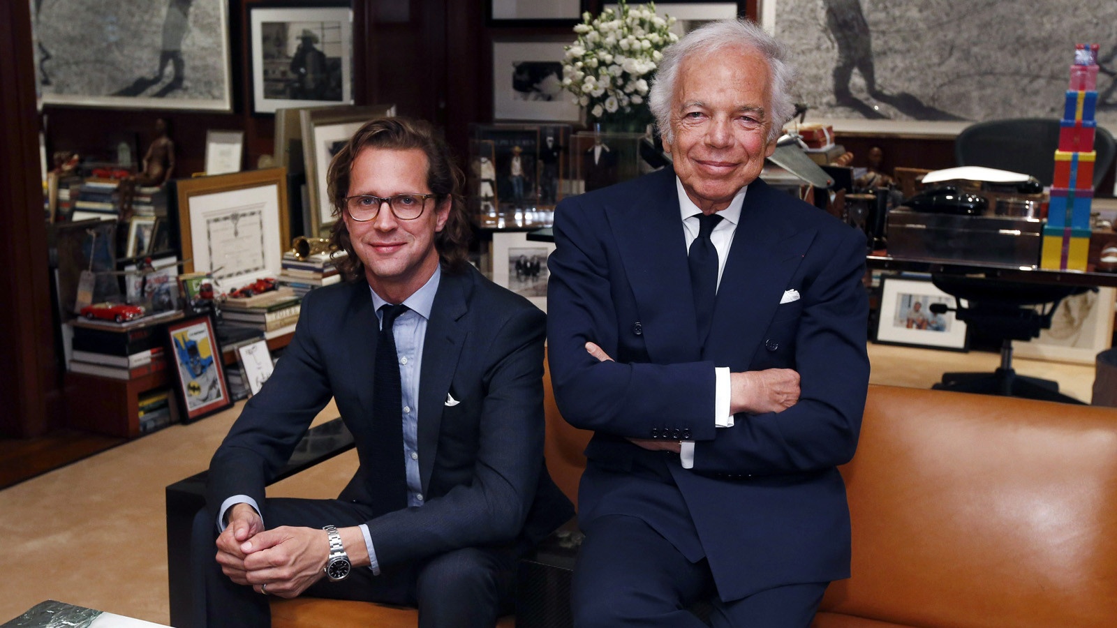 Stefan Larsson, left, seated beside Ralph Lauren in Lauren’s New York office