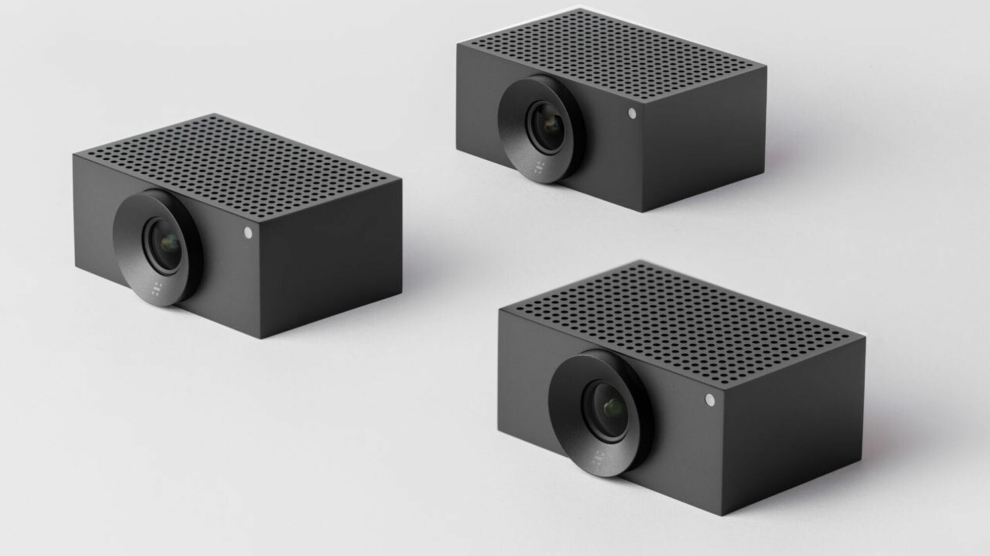 Three Huddly cameras with fixed lenses and perforated housings