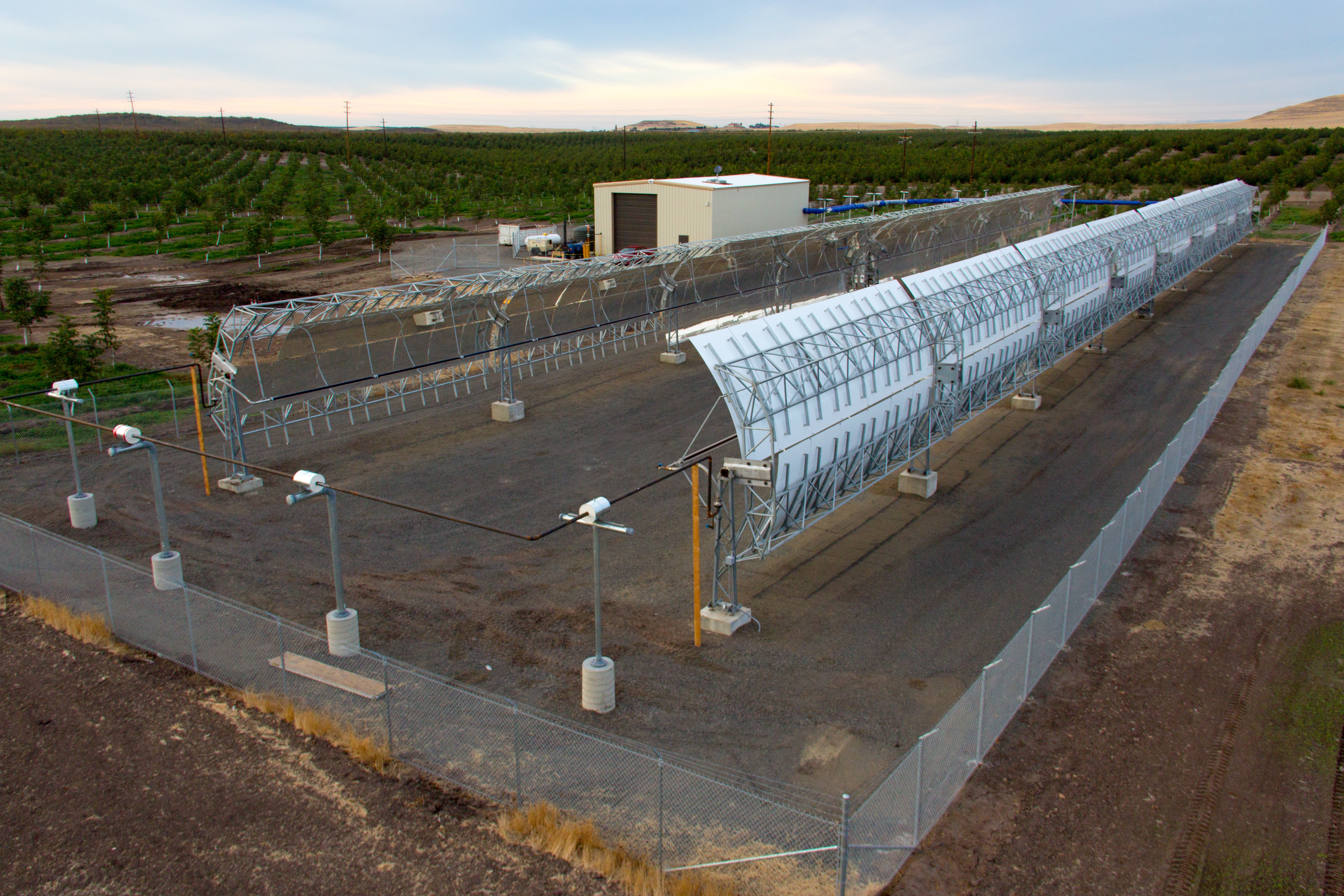 Rows of solar concentrators at Terrajoule’s proof-of-concept installation, beside agricultural land