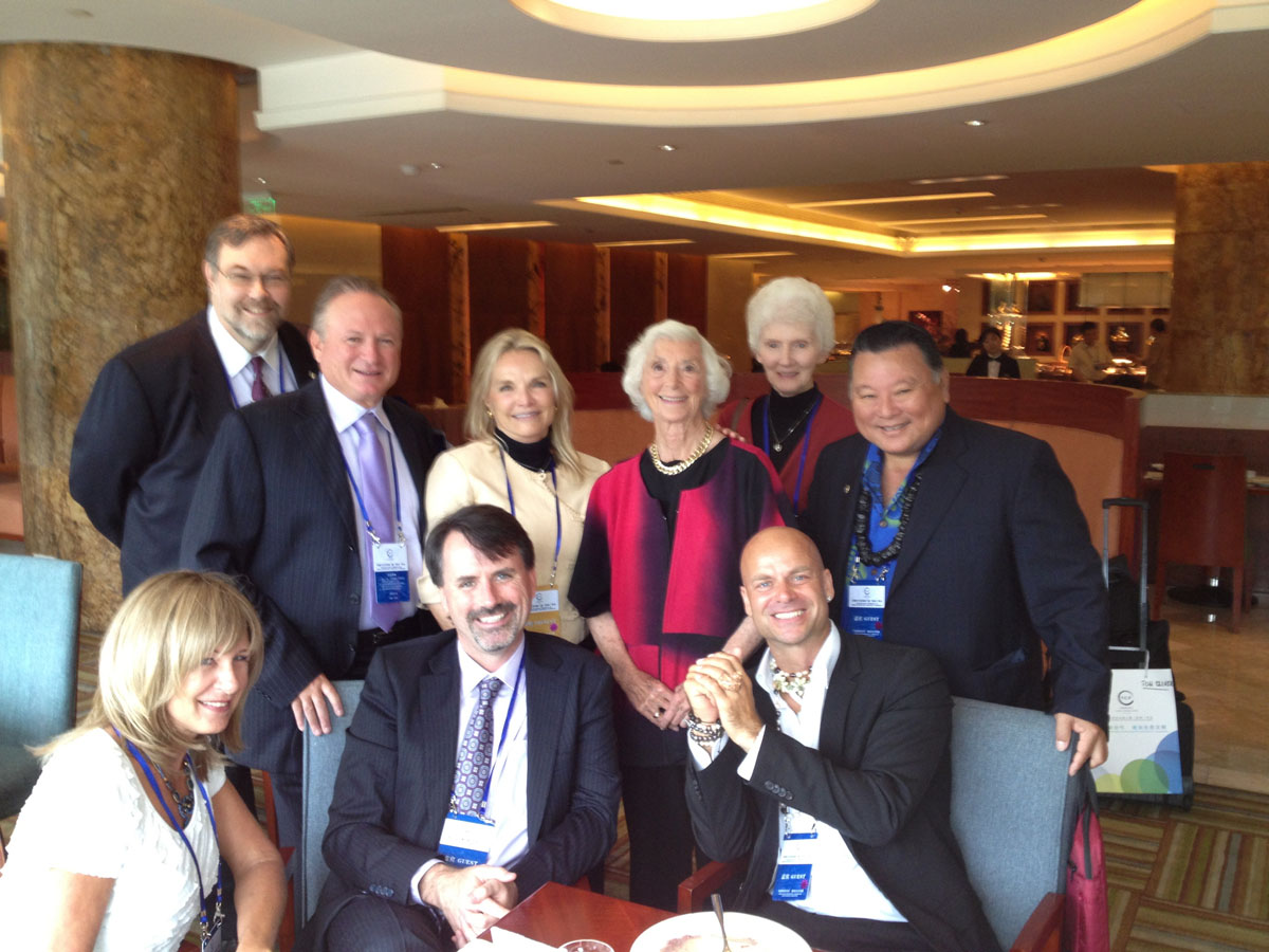 Speakers seated together onstage at the World Cultural Forum, from Stephen Dinan's gallery