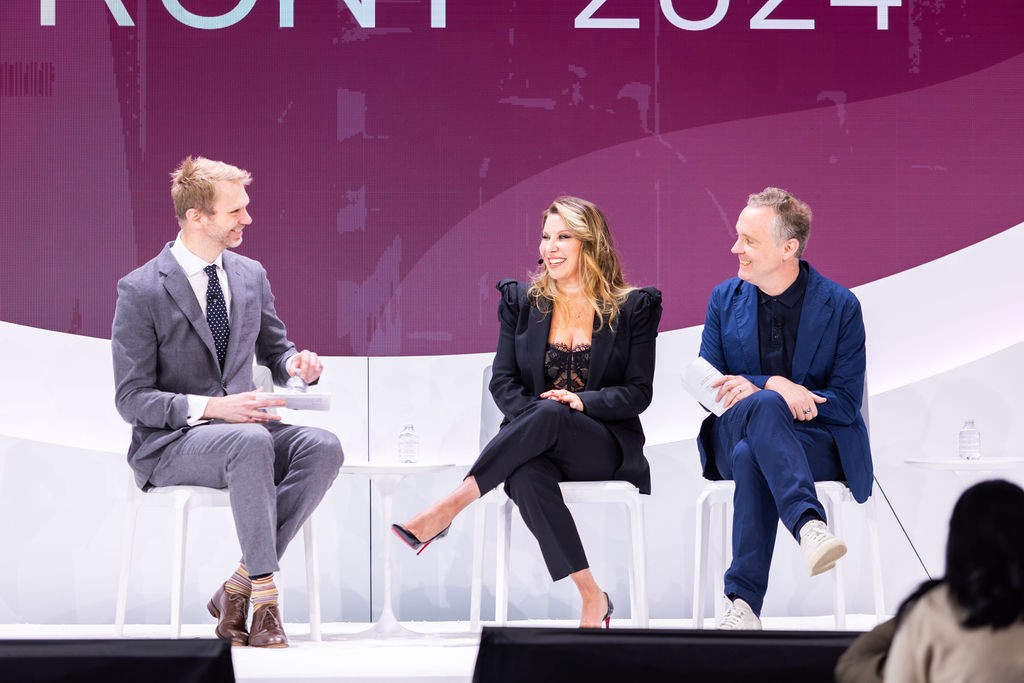 Stephen Farquhar with fellow speakers on the PHM HealthFront stage in 2024