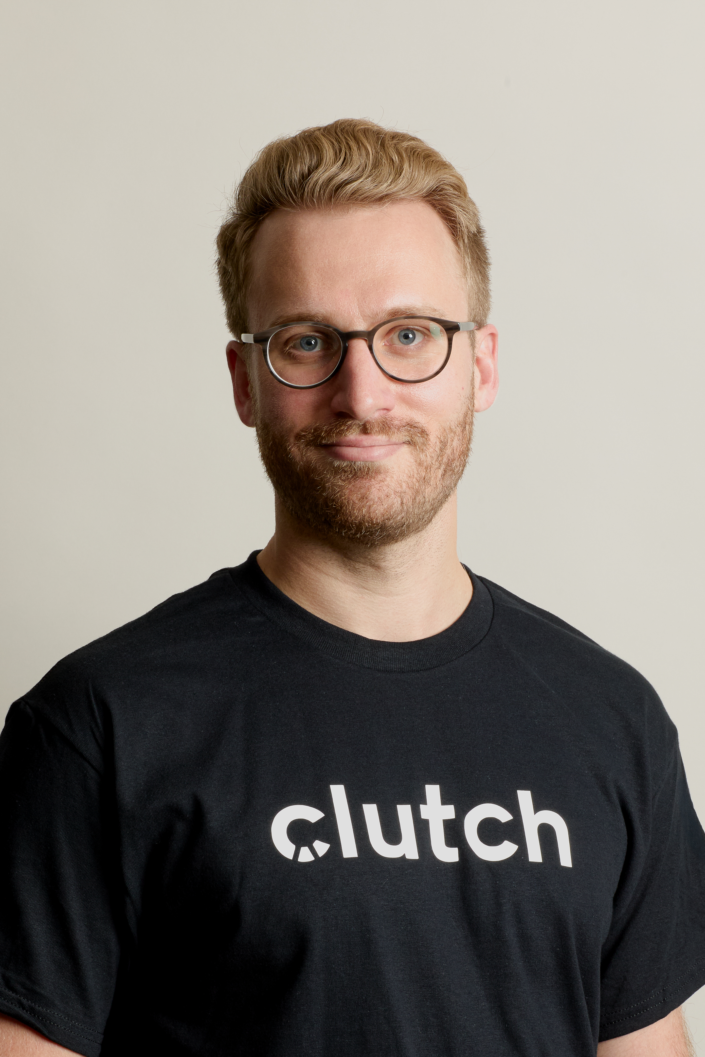 Stephen Seibel wearing a black Clutch sweatshirt