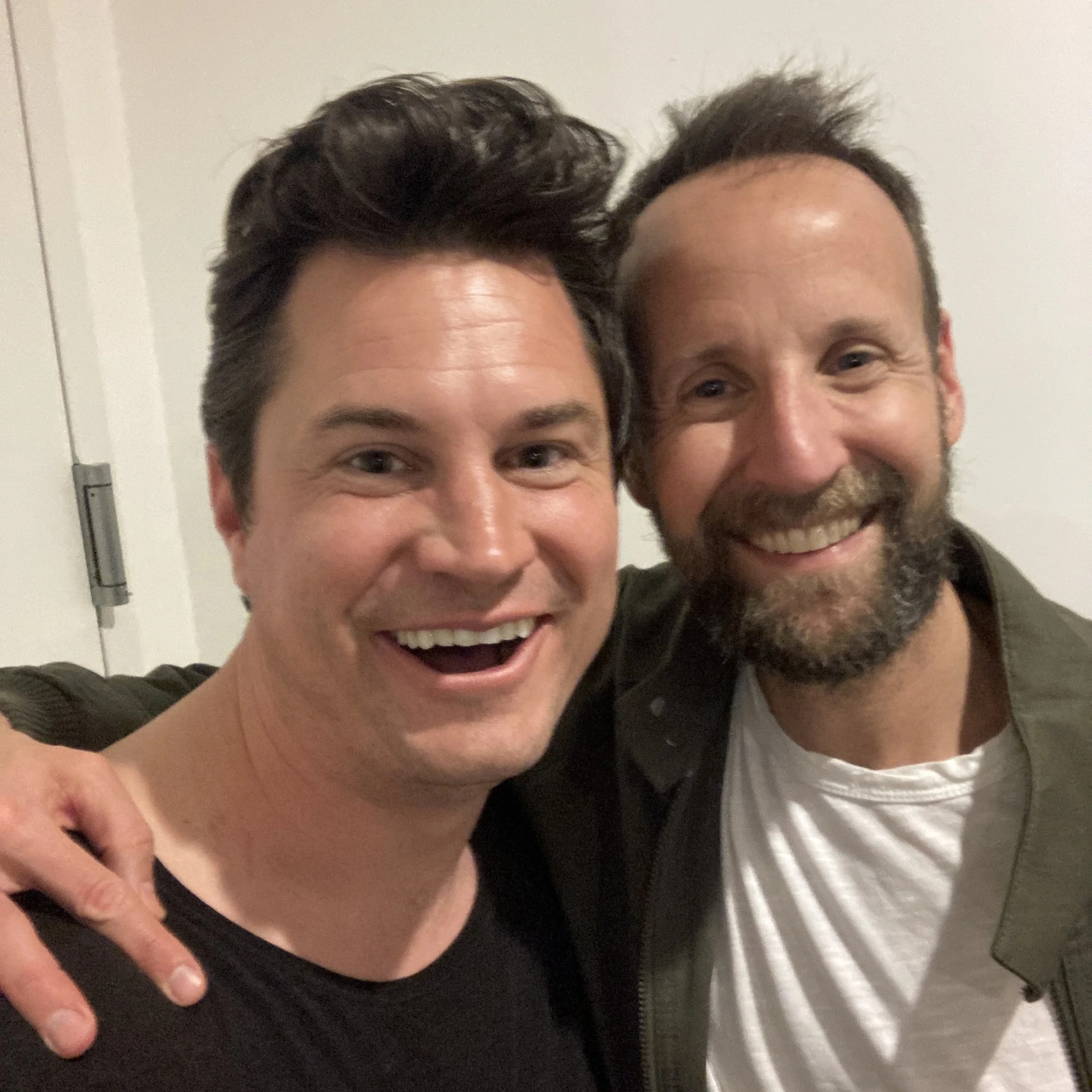 Stephen Sokoler, right, smiling beside Portfolio Career Podcast host David Nebinski