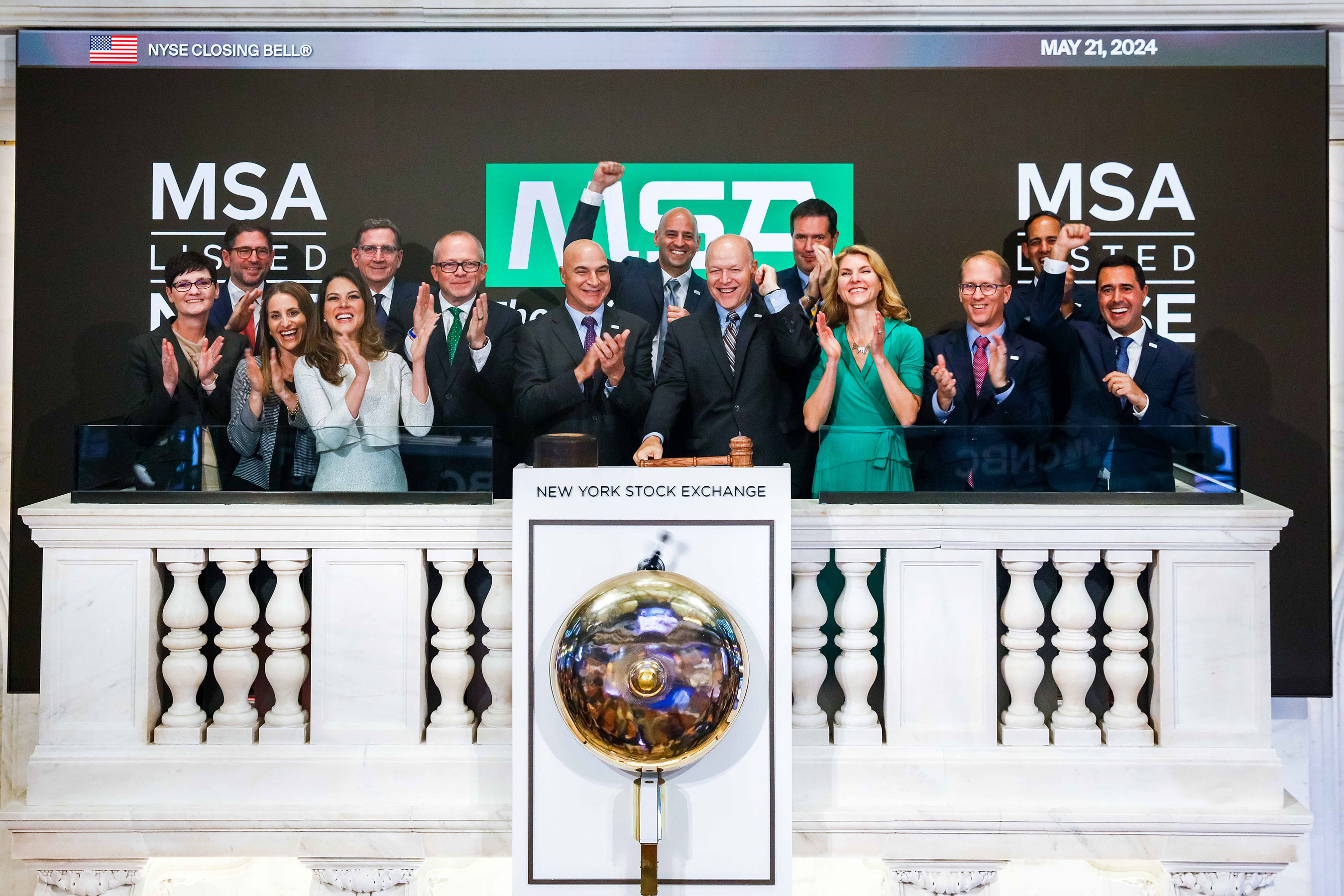 Steve Blanco, at center right beside Nish Vartanian, celebrates the NYSE closing bell with MSA colleagues on May 21, 2024.