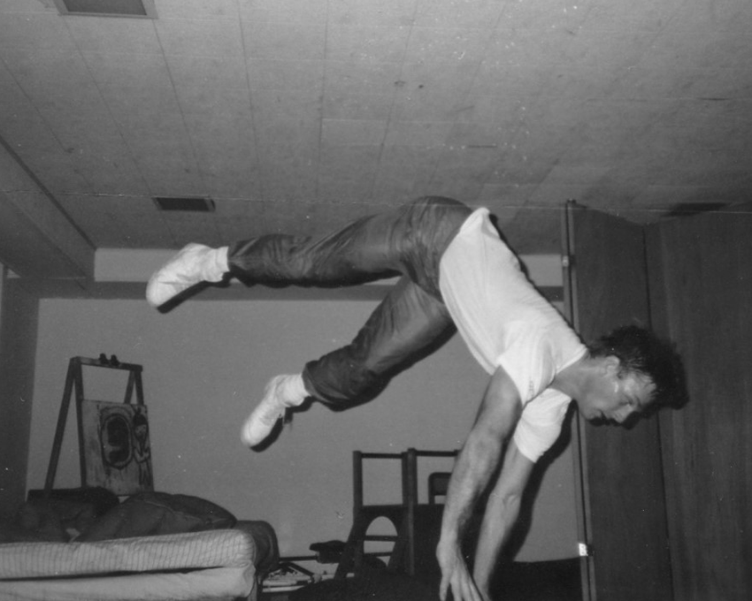 An archival black-and-white photograph of Steve Graham breaking in 1985