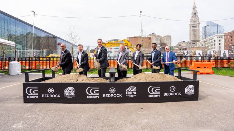 Steve Winn, fourth from left, joins Cosm partners and Cleveland officials with shovels at the April 2026 groundbreaking.
