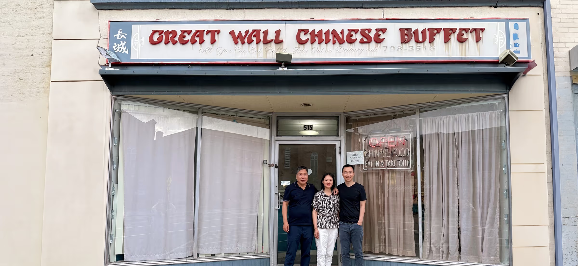 Steve Lin and his family standing outside Great Wall Chinese Buffet