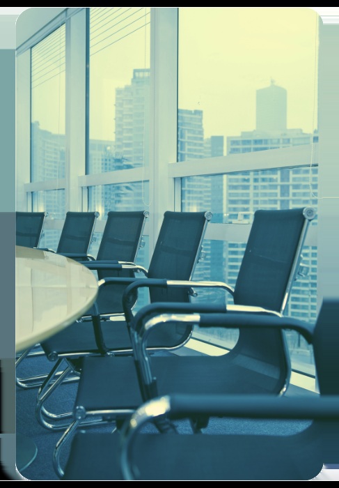 Empty meeting chairs beside tall windows in NotaryCam marketing photography