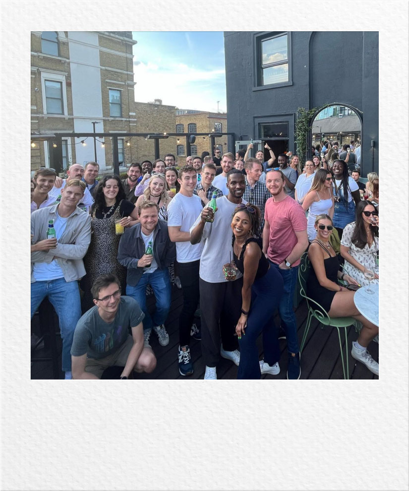 Stint team members gathered outdoors in a company photograph