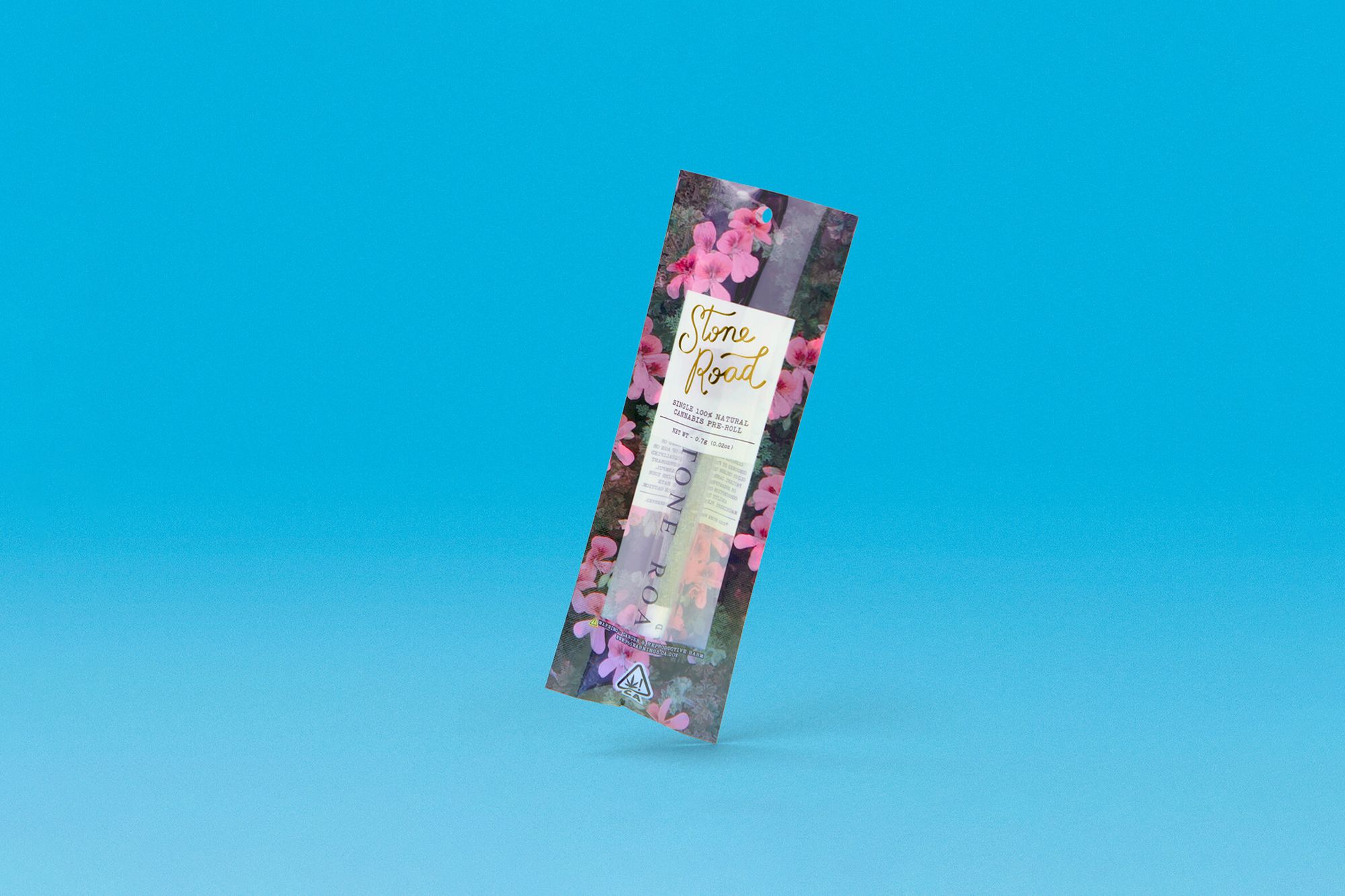 A Stone Road single pre-roll package floating against a bright blue background