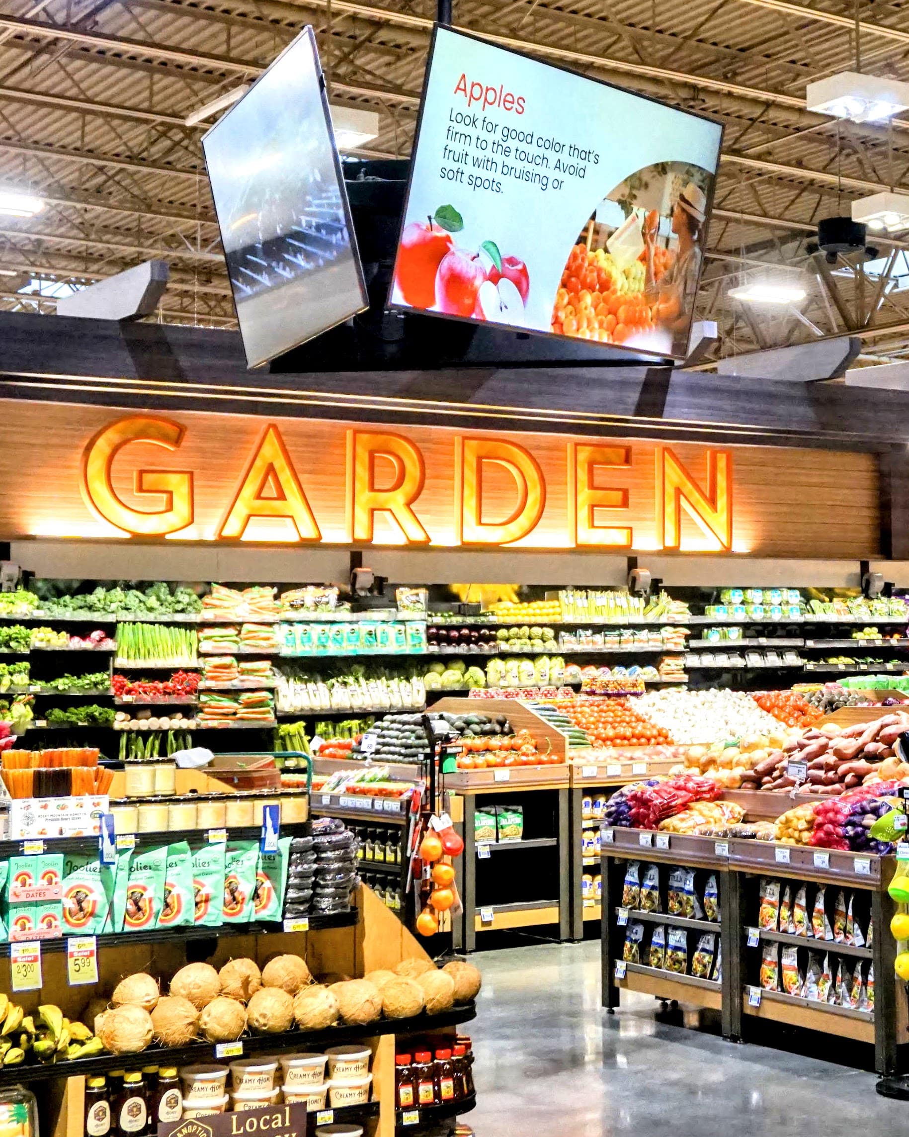 Digital displays above the produce section at an Albertsons store in Boise