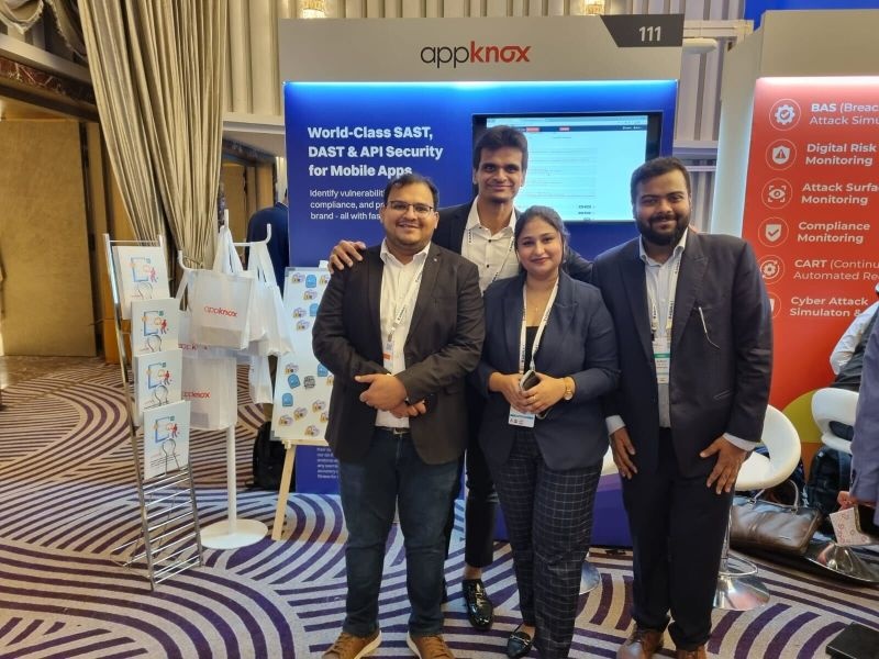 Four Appknox colleagues at conference booth 111, with Subho Halder at the right