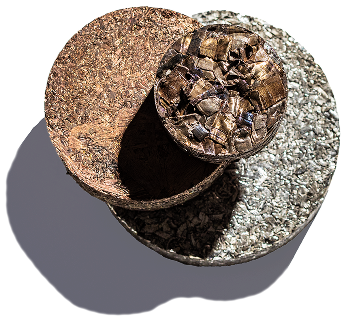 A clean recycled metal puck produced by Sun Metalon's process