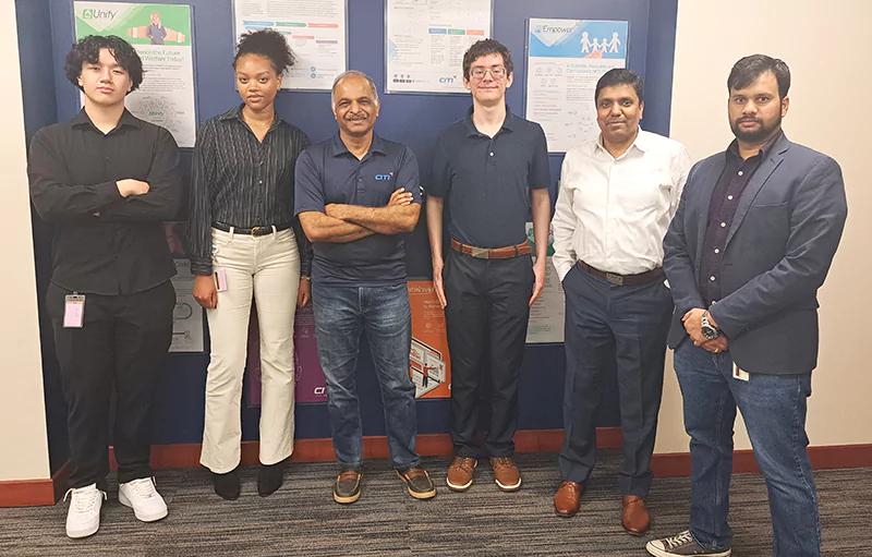 Sunil Kolhekar, third from left, standing with students and colleagues during CITI’s Summer RISE program