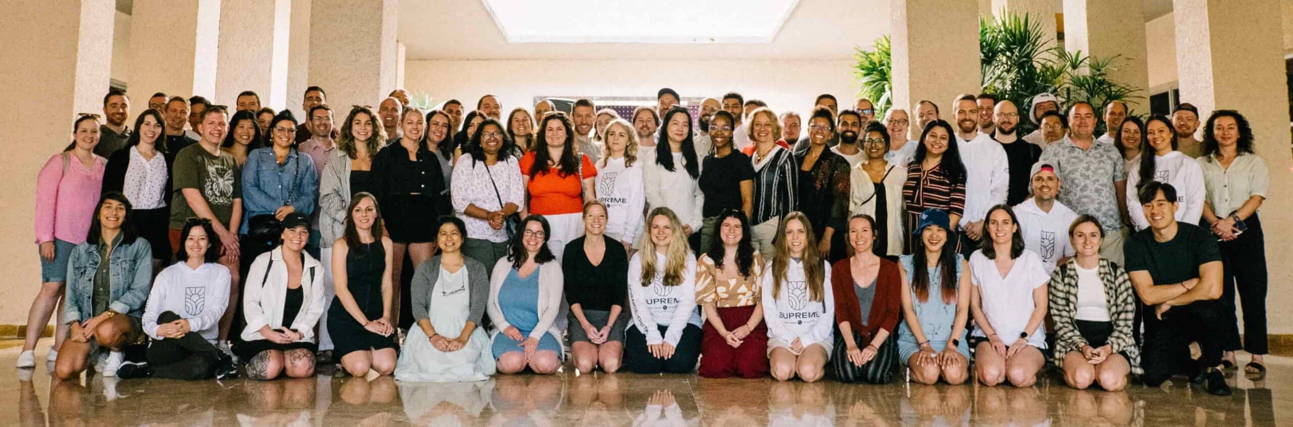Supreme Optimization team members gathered for a group photograph