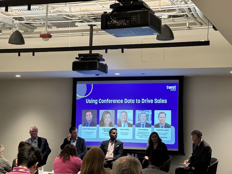 Suresh Balaraman seated with fellow panelists at TWST Events User Group Day in Chicago in October 2024